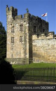 Alnwick Castle in the town of Alnwick in Northumberland in northeast England. Dates from 1096AD when Yves de Vescy became Baron of Alnwick and erected the earliest parts of the castle. Since 1309 the castle has been in the hands of the Percy Family who are the Dukes and Earls of Northumberland.