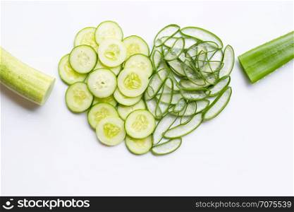 Aloe vera and cucumbers isolated on white background