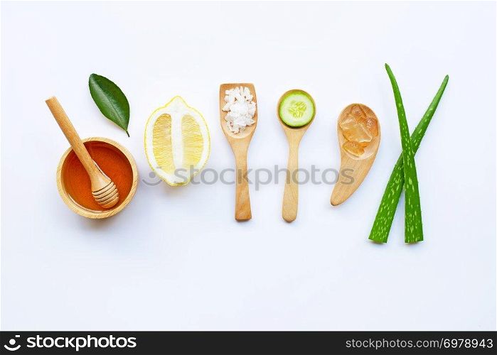 Aloe vera gel, lemon, cucumber, salt, honey. Natural ingredients for homemade skin care on white background. 