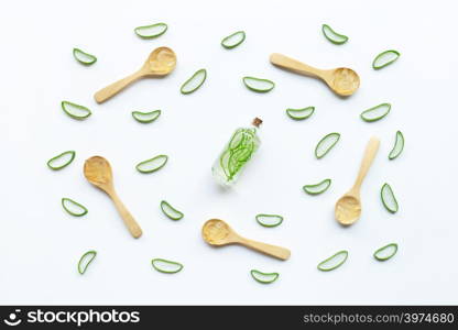 Aloe vera gel with slices and extract on white background.