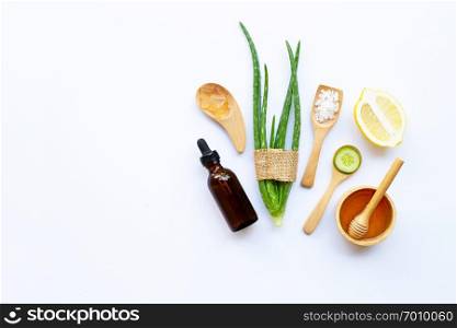 Aloe vera, lemon, cucumber, salt, honey. Natural ingredients for homemade skin care on white. Copy space