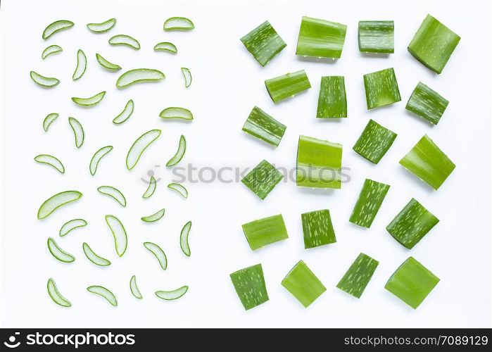 Aloe vera pieces with slices on white background.