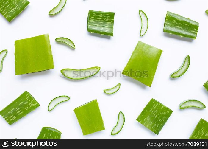 Aloe vera pieces with slices on white background.