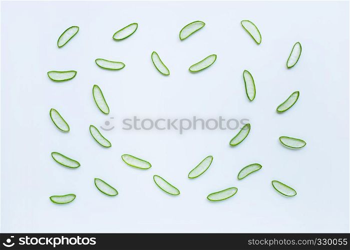 Aloe vera slices on white background. Aloe vera is a popular medicinal plant that is used for health and beauty.