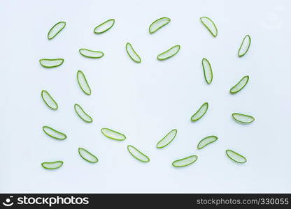 Aloe vera slices on white background. Aloe vera is a popular medicinal plant that is used for health and beauty.