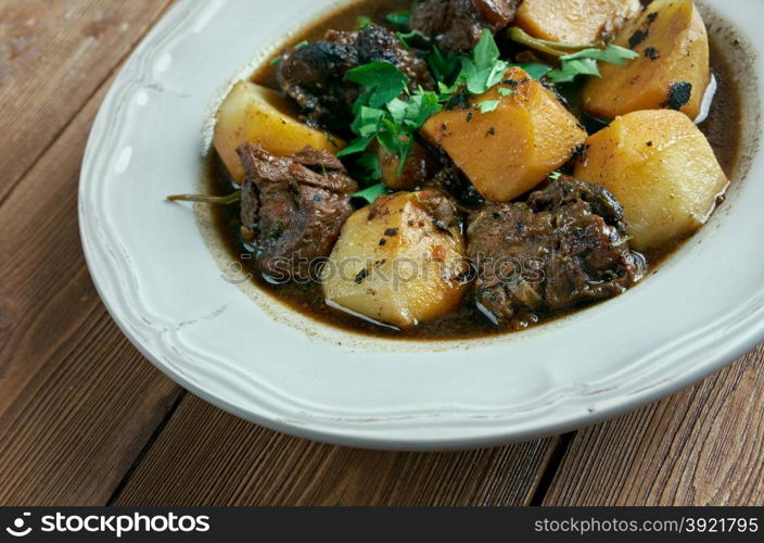 Aloo gosht - meat curry in North Indian and Pakistani cuisine.consists potatoes aloo cooked with meat gosht