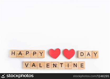 Alphabet letter wooden blocks tiles Valentine`s day on white background, Valentine concept, copy space