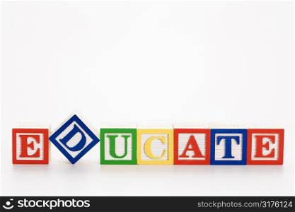 Alphabet toy building blocks spelling the word education.