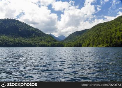 Alpine Lake Alpsee in Ostallgau district of Bavaria, near Neuschwanstein and Hohenschwangau castles. Germany, Europe.