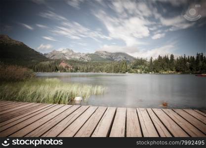 Alpine mountain lake at summer day