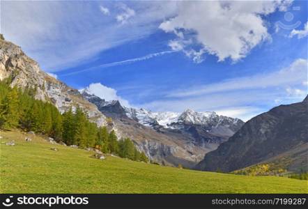 alpine mountain landscape under cloudy sky in Europe