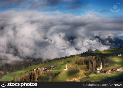 Alpine village in Dolomites mountains. Italian Dolomites