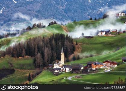 Alpine village in Dolomites mountains. Italian Dolomites