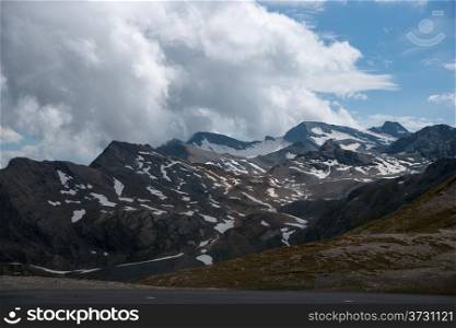 Alps mountain in europe summer vacation under dramatic sky