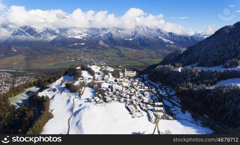 alps mountains in switzerland at winter time aerial view