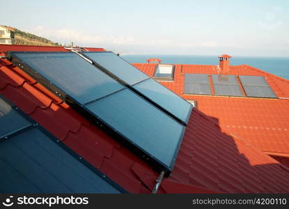 Alternative energy- solar system on the house roof.