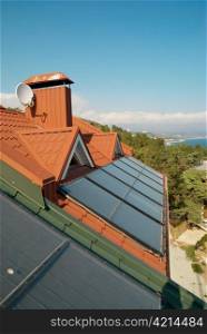 Alternative energy- solar system on the house roof.