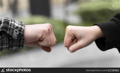 alternative greetings almost touching fist bumps