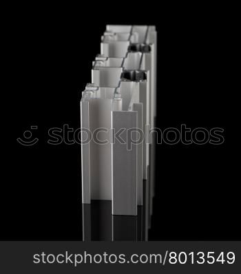 Aluminium profile sample isolated on black background.