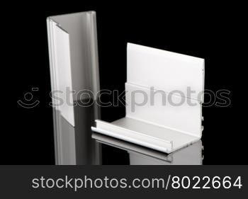 Aluminium profile sample isolated on black background.