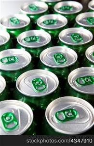 Aluminum cans with keys close-up, focus on center