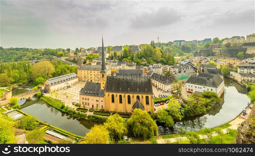 Alzette river bend with Saint Jean Du Grund cathedral, Luxembourg city, Luxembourg