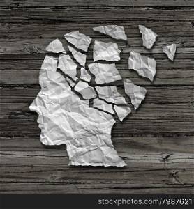 Alzheimer patient medical mental health care concept as a sheet of torn crumpled white paper shaped as a side profile of a human face on an old grungy wood background as a symbol for neurology and dementia issues or memory loss.