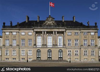 Amalienborg Palace - Copenhagen - Denmark. Amalienborg is the home of the Danish royal family and a popular tourist attraction.