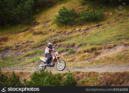 amateur motocross drivers have hobby ride on mountains road