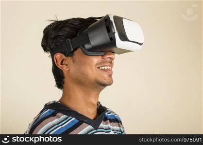 Amazed young boy experiencing virtual reality headset