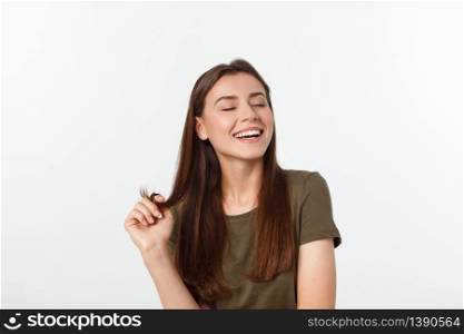 amazement - woman excited looking to the side. Surprised happy young woman looking sideways in excitement. Mixed race Asian and white Caucasian female model on grey background. amazement - woman excited looking to the side. Surprised happy young woman looking sideways in excitement. Mixed race Asian and white Caucasian female model on grey background.
