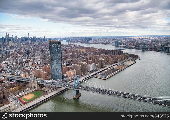 Amazing aerial view of Williamsburg and Manhattan bridges in New York City.