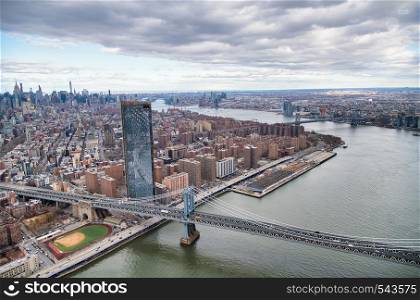 Amazing aerial view of Williamsburg and Manhattan bridges in New York City.