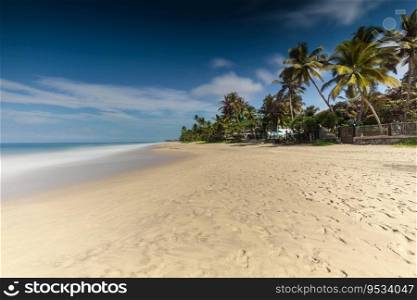 Amazing beach landscape. Beautiful view on a clear sandy coast on exotic beach resort. Peaceful summer vacation on Sri Lanka.. Beautiful beach landscape Sri Lanka