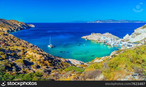 Amazing beach view, beautiful panoramic landscape of a lagoon with mountains around it, gorgeous nature of Milos island, Greece, Europe, summer vacation on Mediterranean sea
