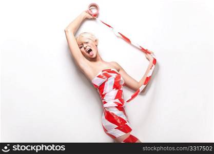 Amazing blond beauty screaming wrapped in warning tape