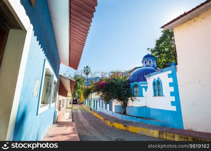 Amazing colorful buildings in pueblo magico Batopilas in Barrancas del Cobre mountains, Mexico