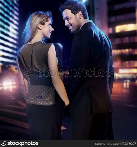 Amazing couple in love over the city background
