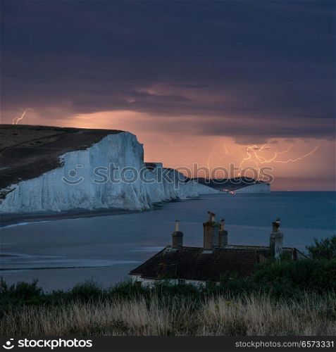 Amazing dramatic electrical lightning storm over white cliffs landscape, on English South Coast