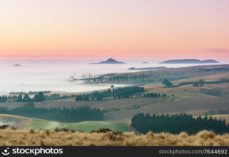 Amazing foggy rural landscapes at morning. New Zealand beautiful nature