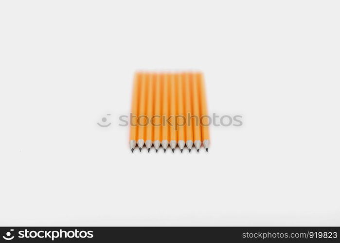 Amazing isolated pencils on pure white background. Orange pencil. Amazing isolated pencils on pure white background