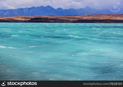 Amazing natural landscapes in New Zealand. Mountains lake at sunset.