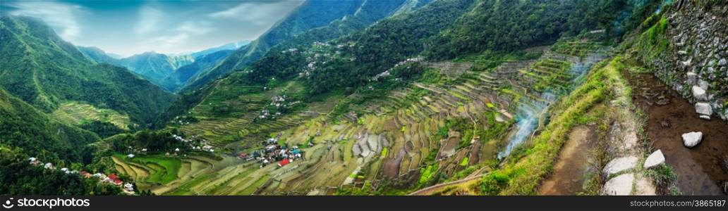 Amazing panorama view of rice terraces fields in Ifugao province mountains under cloudy blue sky. Banaue, Philippines UNESCO heritage