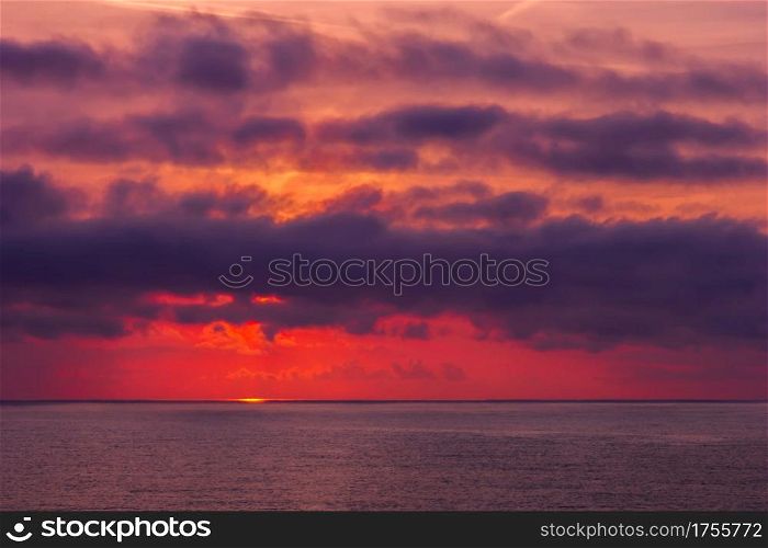 Amazing red sunrise or sunset over the sea. Nature background