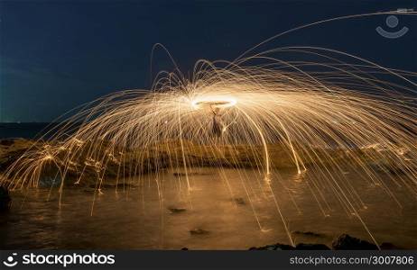 Amazing steel wool coast the sea on the beach in sunset time.