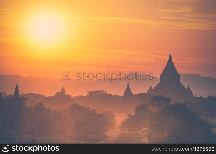 Amazing sunset colors and silhouettes of ancient Buddhist Temples at Bagan Kingdom, Myanmar (Burma). Travel landscape and destinations