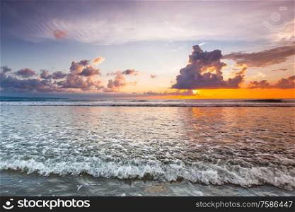 Amazing sunset form Bali Double Six beach surf waves and colorful clouds. Amazing sunset form Bali beach