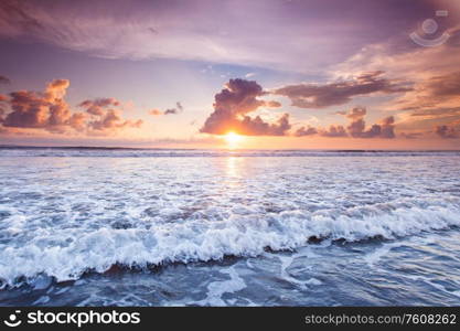 Amazing sunset from Bali Double Six beach surf waves and colorful clouds. Amazing sunset from Bali beach