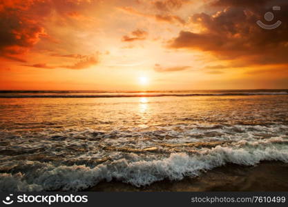 Amazing sunset from Bali Double Six beach surf waves and colorful clouds. Amazing sunset from Bali beach