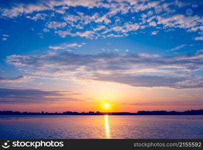 Amazing sunset over lake. Ukraine. Amazing sunset over lake